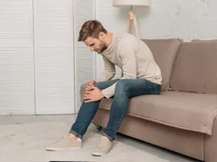 Knee Pain When Sitting? Causes and Treatment